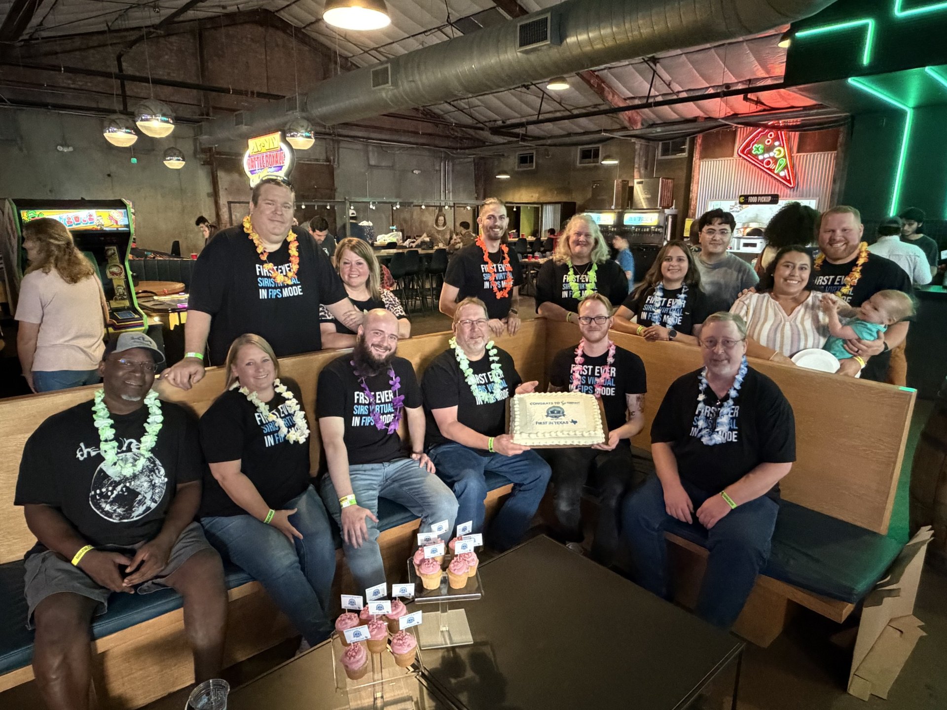 Justice IT Consulting family and team celebrating together
